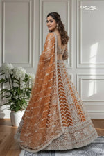 Rust Orange Butterfly Net Hand-Embroidered Lehenga Ensemble